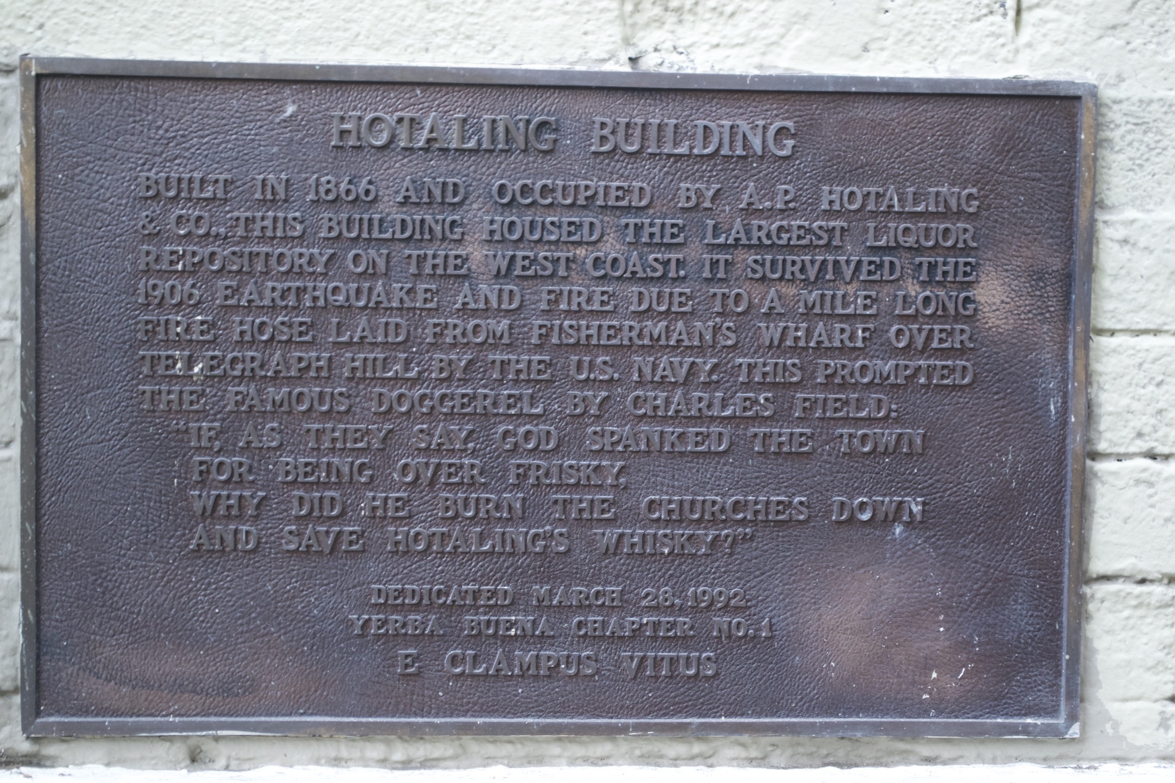 An old plaque that reads, 